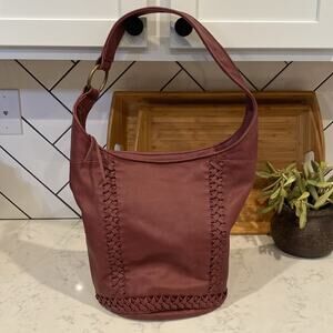 The SAK Skye Leather Boho Bucket Shoulder Bag Tassle Braided Cabernet Red
